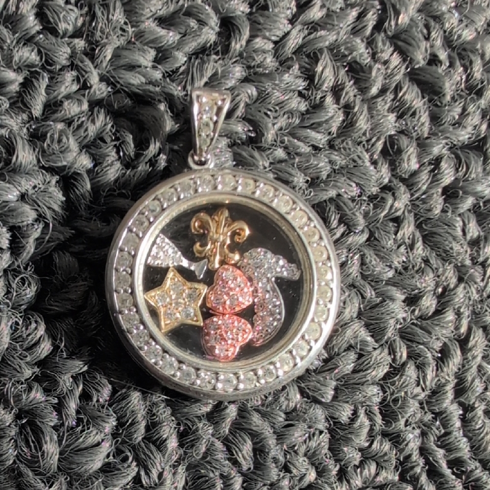 Silver and Gold pendant with Crystal Face